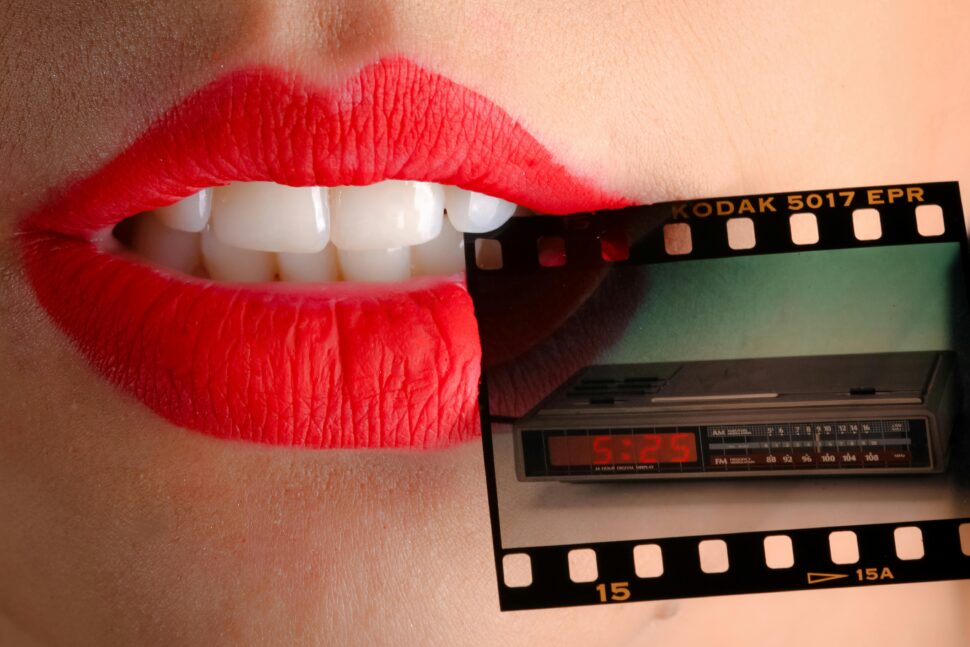 https://www.pexels.com/photo/person-wearing-red-lipstick-biting-film-1161934/
