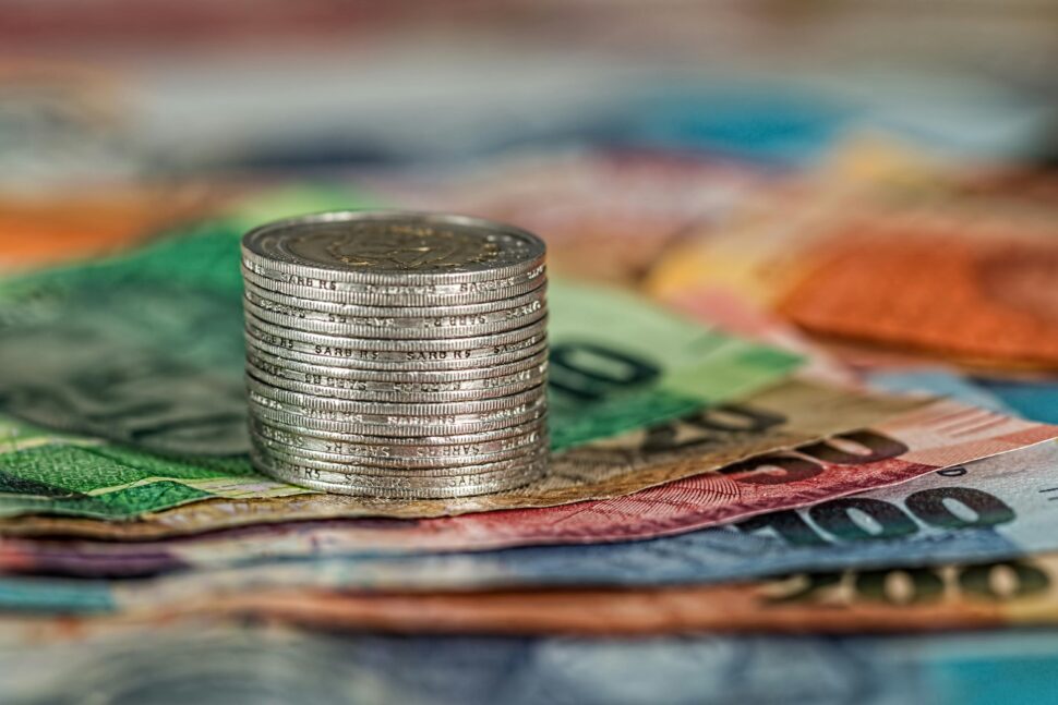 https://www.pexels.com/photo/assorted-banknotes-and-round-silver-colored-coins-210574/