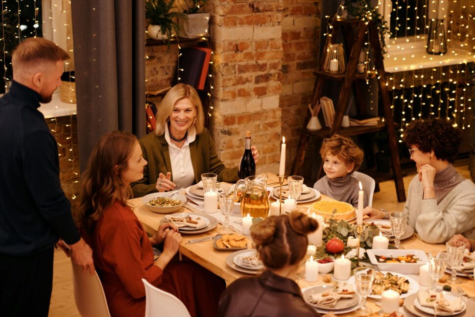 https://www.pexels.com/photo/family-celebrating-christmas-dinner-5775053/