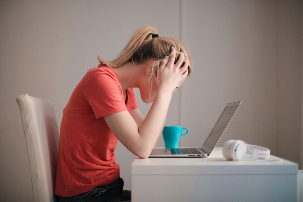 https://www.pexels.com/photo/woman-in-red-t-shirt-looking-at-her-laptop-3755761/