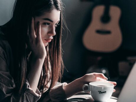 https://www.pexels.com/photo/photo-of-woman-lying-on-bed-while-using-laptop-4066041/