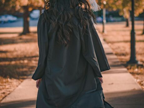 https://www.pexels.com/photo/woman-in-black-long-sleeve-dress-standing-on-brown-concrete-pathway-3186386/
