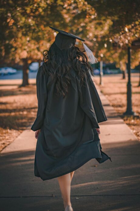 https://www.pexels.com/photo/woman-in-black-long-sleeve-dress-standing-on-brown-concrete-pathway-3186386/