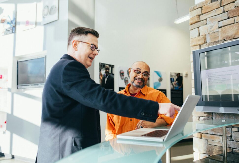 https://www.pexels.com/photo/man-pointing-laptop-computer-2182981/