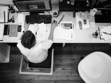 https://www.pexels.com/photo/black-and-gray-photo-of-person-in-front-of-computer-monitor-140945/