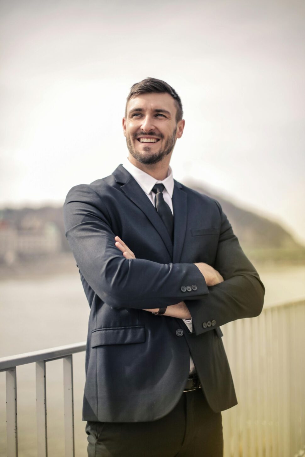 https://www.pexels.com/photo/man-in-black-suit-jacket-standing-and-smiling-3777557/