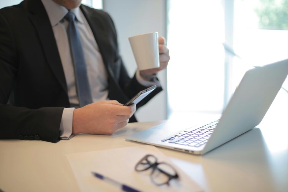https://www.pexels.com/photo/man-in-black-suit-drinking-coffee-3760058/