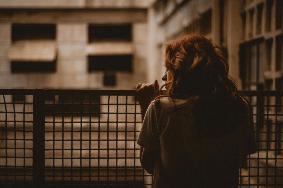 https://www.pexels.com/photo/woman-holding-on-railings-2935814/