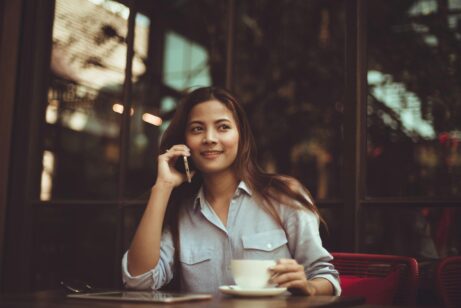 https://www.pexels.com/photo/portrait-of-young-woman-using-mobile-phone-in-cafe-323503/