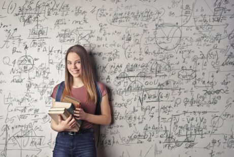 https://www.pexels.com/photo/woman-holding-books-3768126/