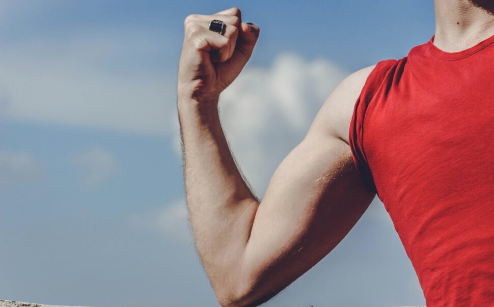 https://www.pexels.com/photo/man-raising-his-right-arm-2080544/