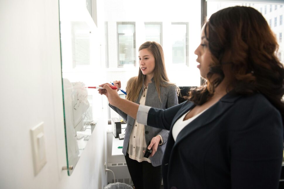https://unsplash.com/photos/two-women-writing-on-glass-panel-HG9M8M29Ig4