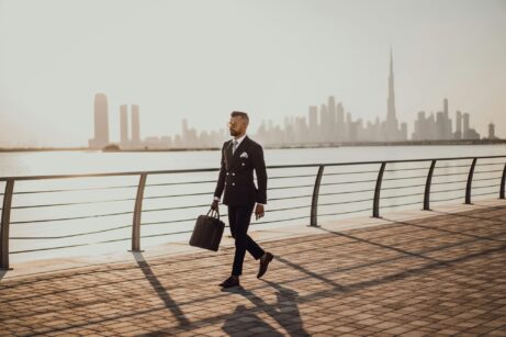 https://www.pexels.com/photo/man-walking-on-pavement-while-holding-a-bag-3307862/