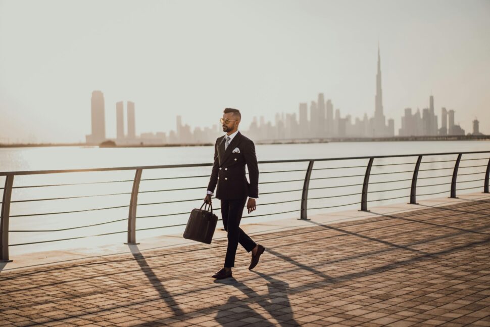 https://www.pexels.com/photo/man-walking-on-pavement-while-holding-a-bag-3307862/