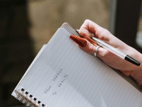 https://www.pexels.com/photo/woman-with-long-nails-writing-text-in-diary-7256738/