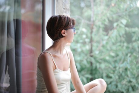 https://www.pexels.com/photo/pensive-woman-looking-at-window-3769012/