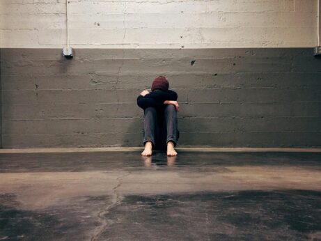 https://www.pexels.com/photo/person-leaning-on-wall-236151/