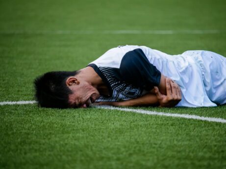 https://www.pexels.com/photo/man-crying-on-field-1277396/
