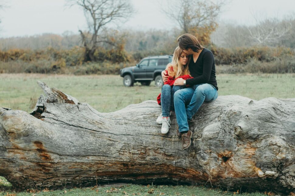 https://www.pexels.com/photo/mother-and-daughter-sitting-on-tree-log-840566/