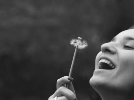 https://www.pexels.com/photo/smiling-woman-holding-dandelion-flower-403448/