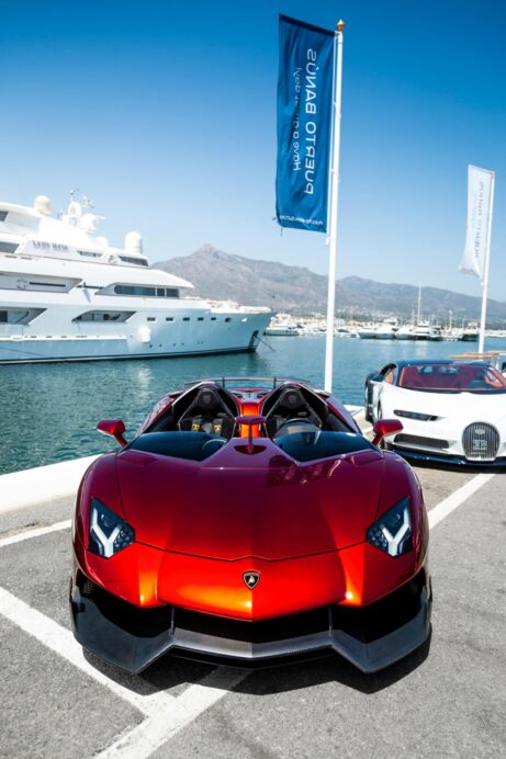 https://www.pexels.com/photo/luxury-supercars-at-marbella-port-with-yacht-29964445/