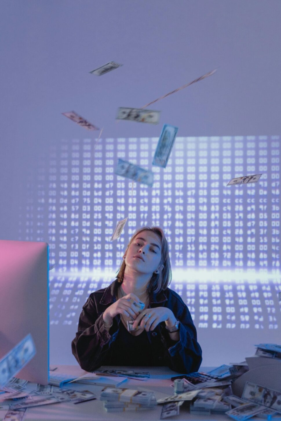 https://www.pexels.com/photo/a-confident-woman-holding-bundles-of-cash-money-6266641/